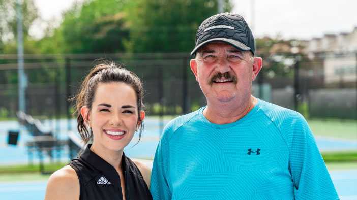 John and his daughter at the tennis court
