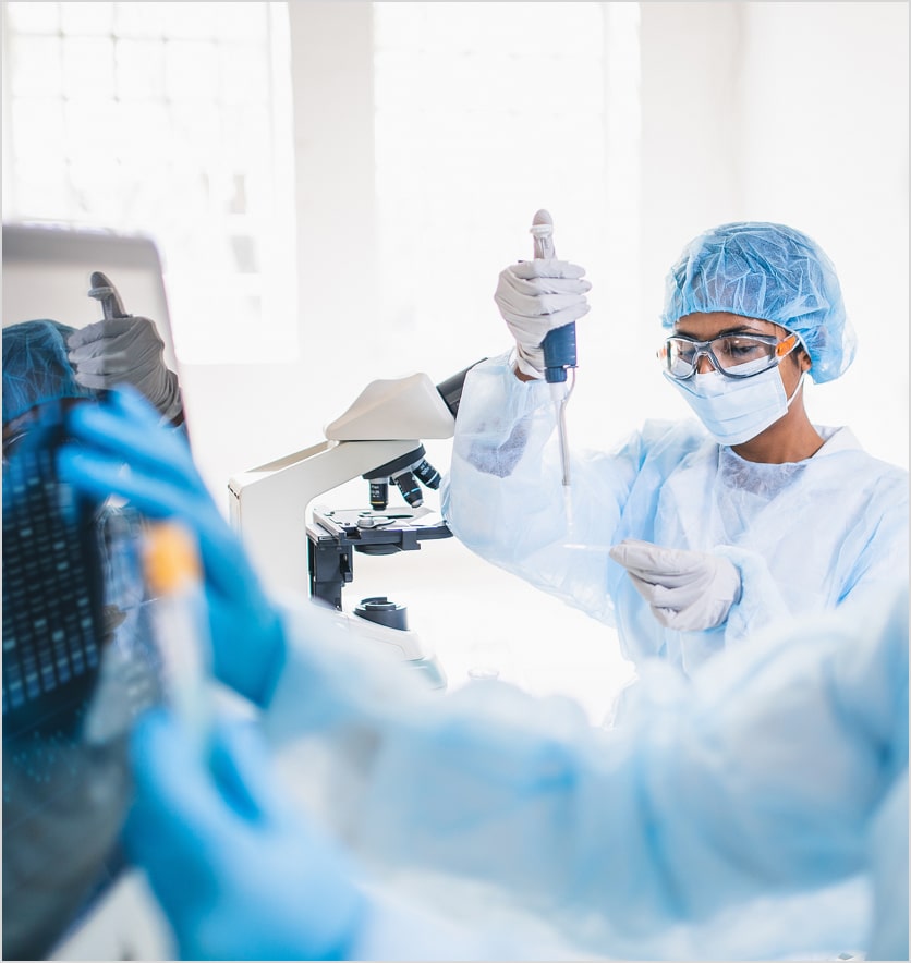 researcher with pipette