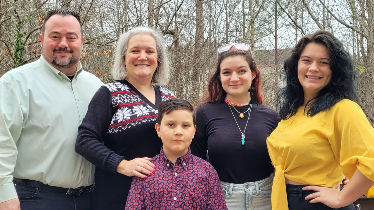 Photo of Alexis and his family