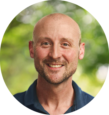 Smiling man named Bryan B. looking at the camera 