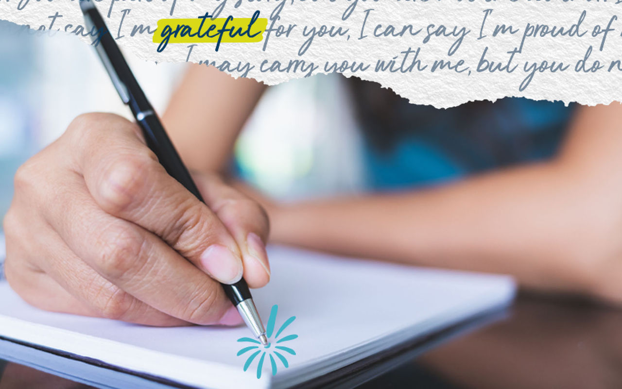 Hand writing a letter