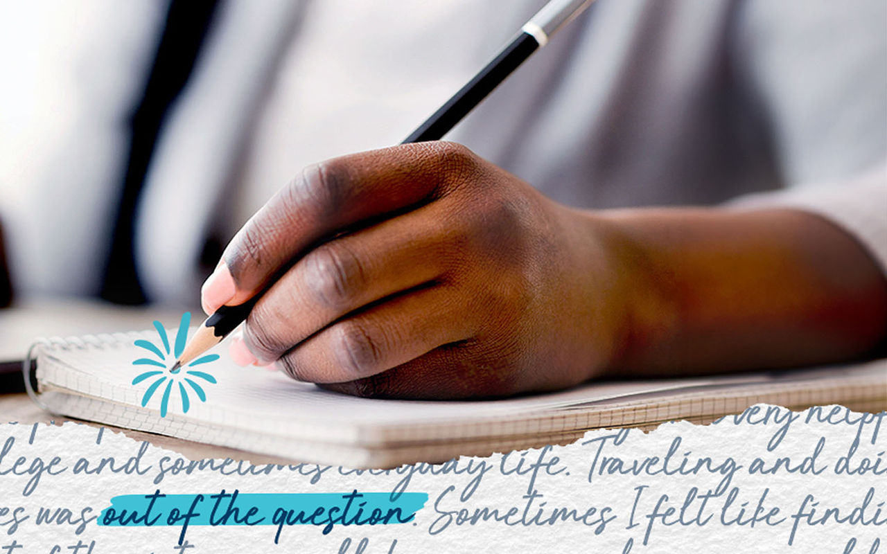 Hand writing a letter