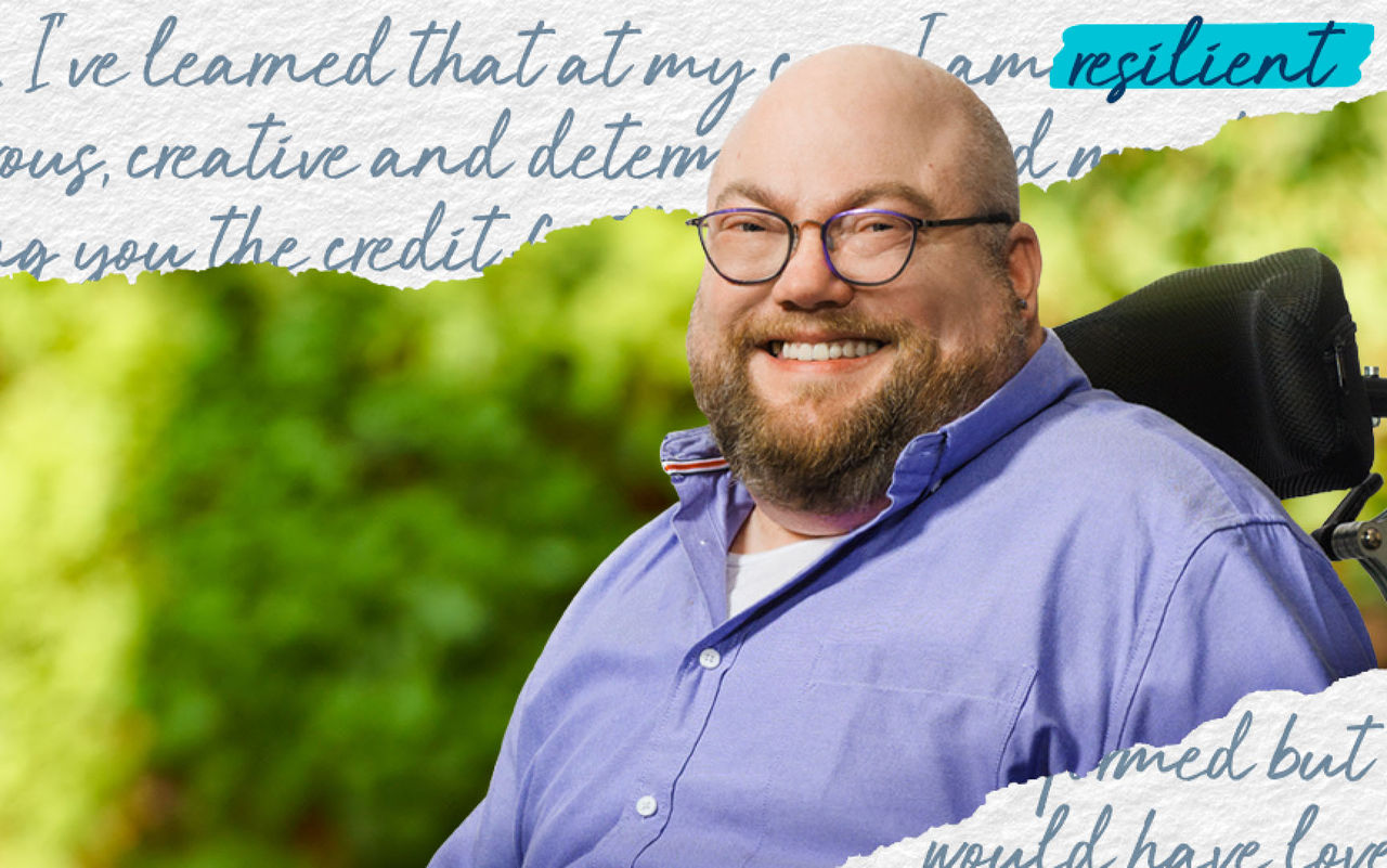 Zach smiling outside