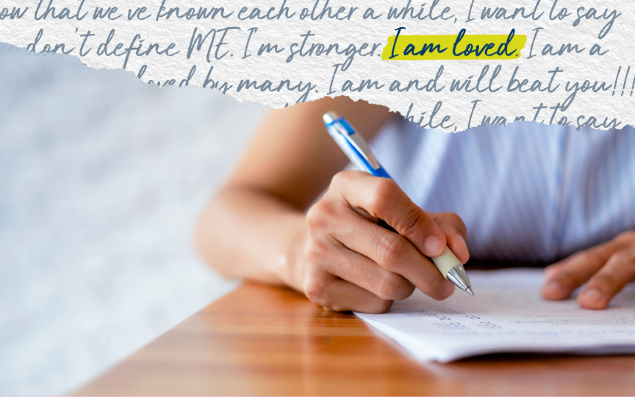 Hand writing a letter