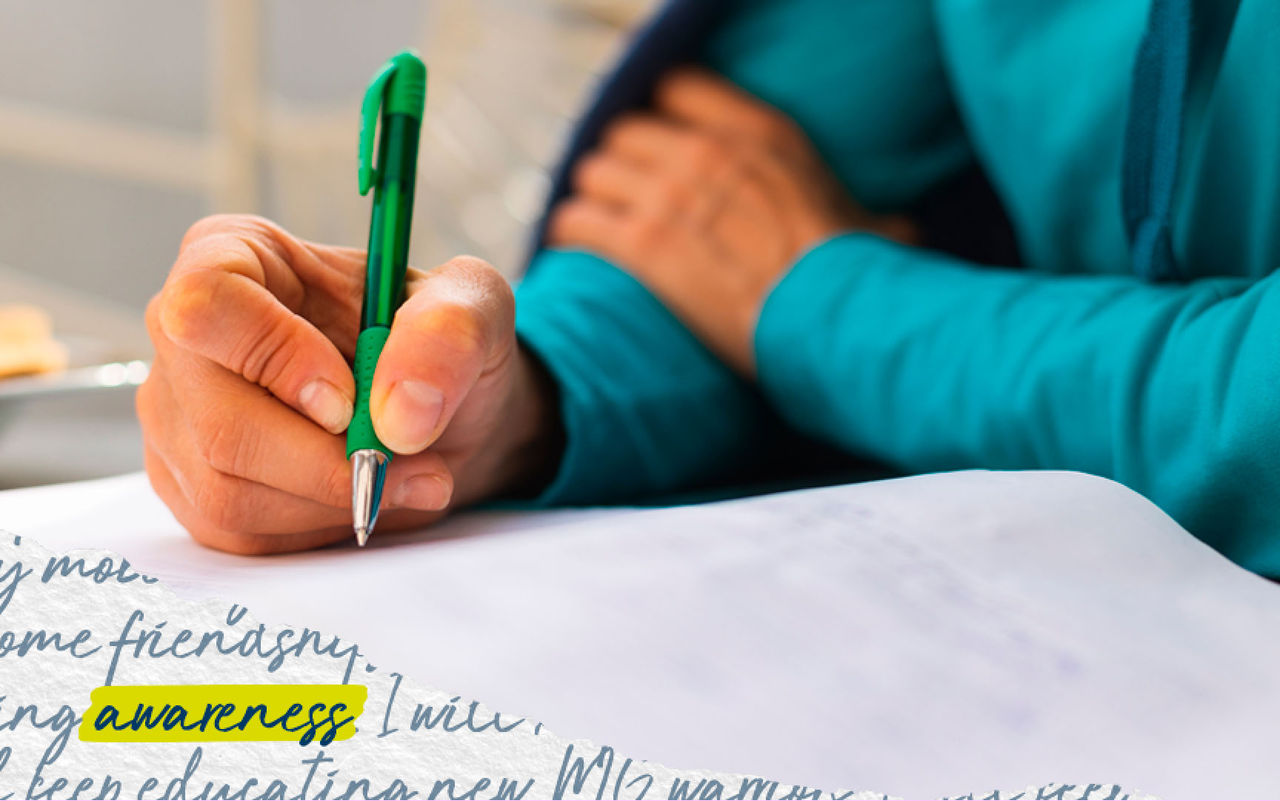 Hand writing a letter