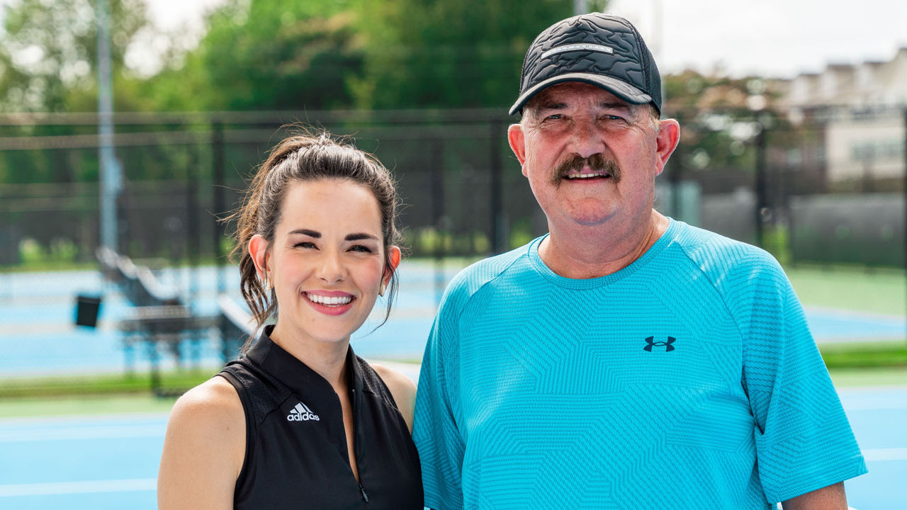 John and his daughter at the tennis court