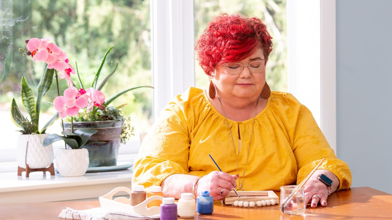Kathi doing arts and crafts
