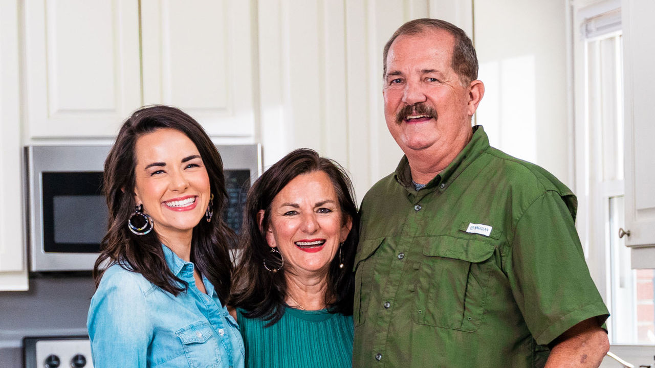Photo of Mary with John and their daughter, Whitney